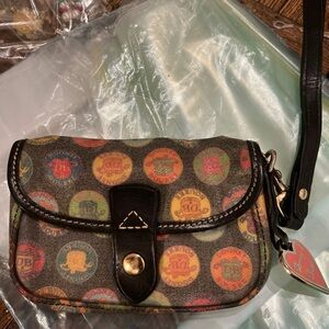 DOONEY AND BOURKE LOGO GLAZED CANVAS WRISTLET /enamel pink heart charm, clean